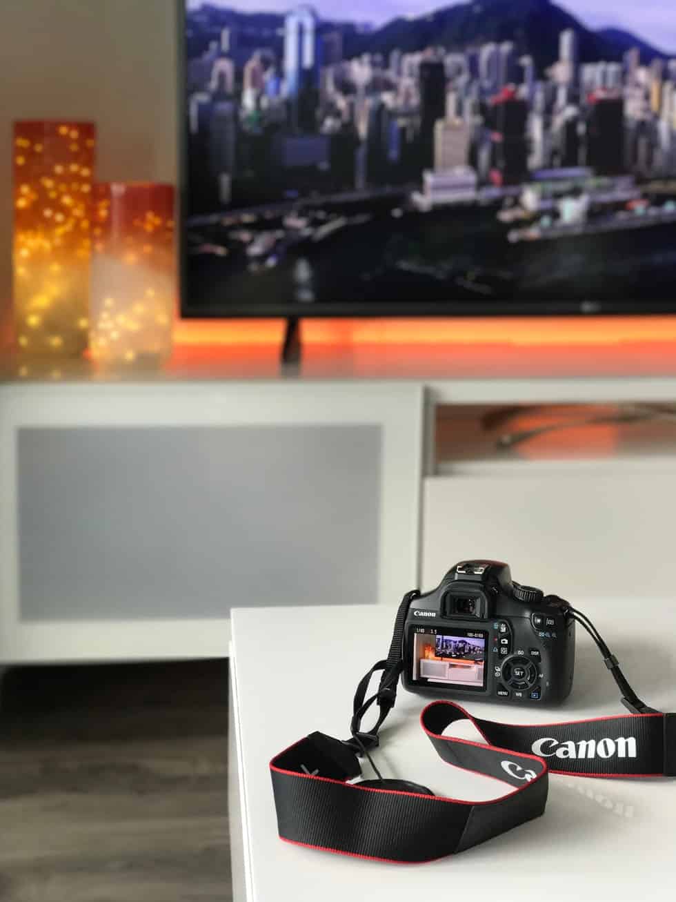 camera on desk in front of tv